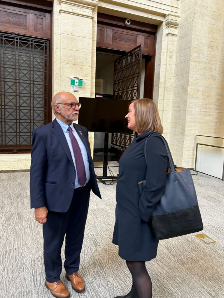 CEO Kelly Masotti chatting with Senator Ravalia